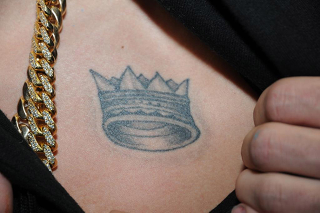 Illustration for article titled Justin Bieber's Tattoos Documented by the Miami PD: A Visual Analysis